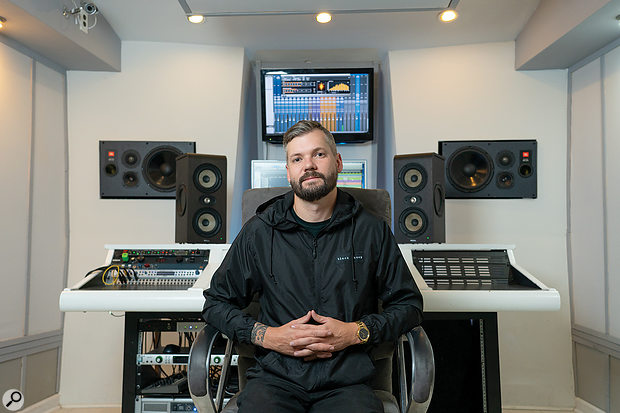 Kevin Black Pearl McCloskey seated in a recording studio