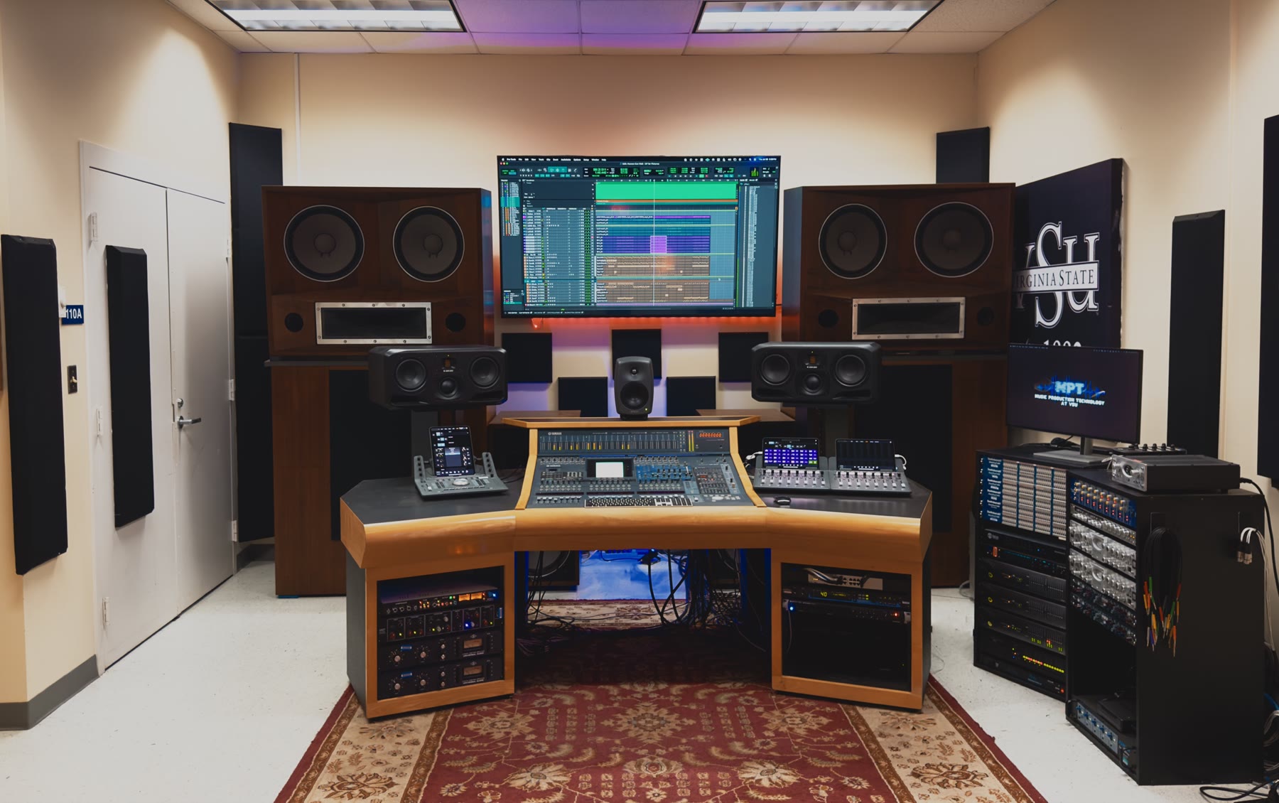 Davis Hall 110 Studio A with console, keyboards, studio monitors, and acoustic treatment