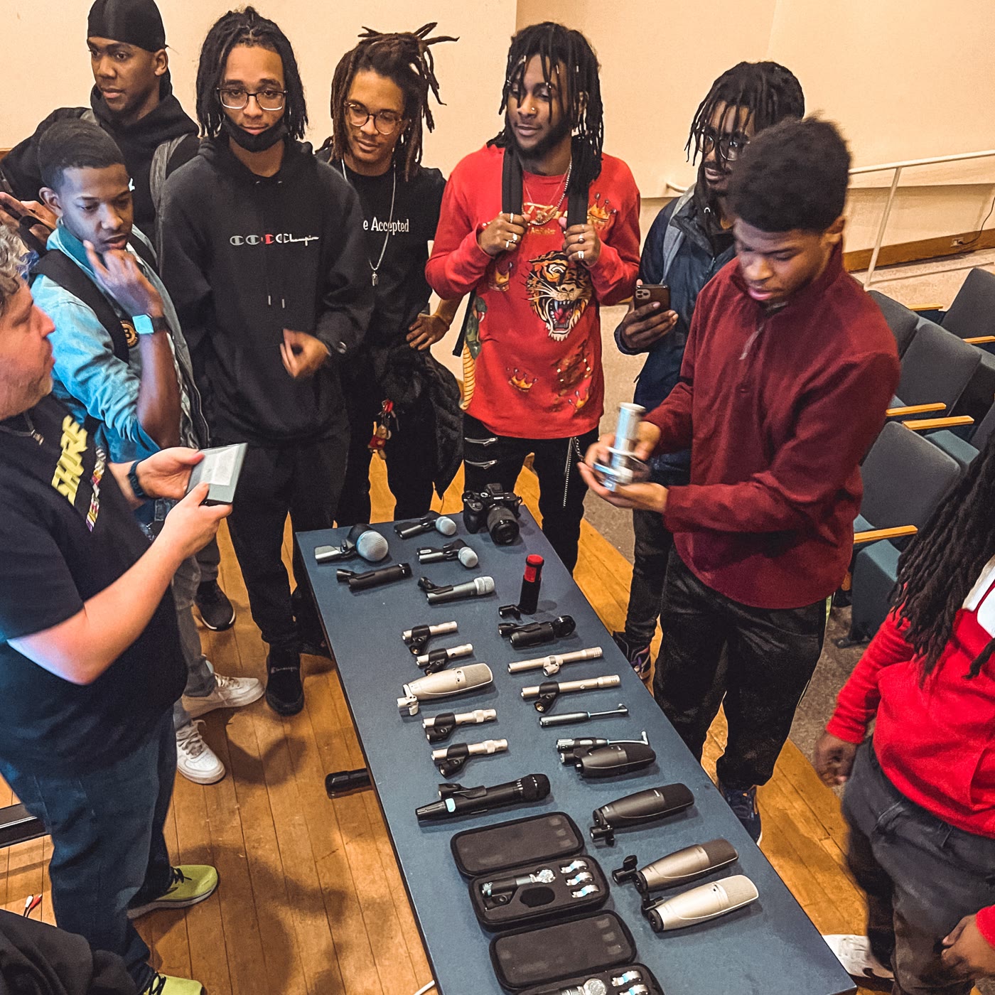 MPT students comparing microphones during a Shure Microphones guest session