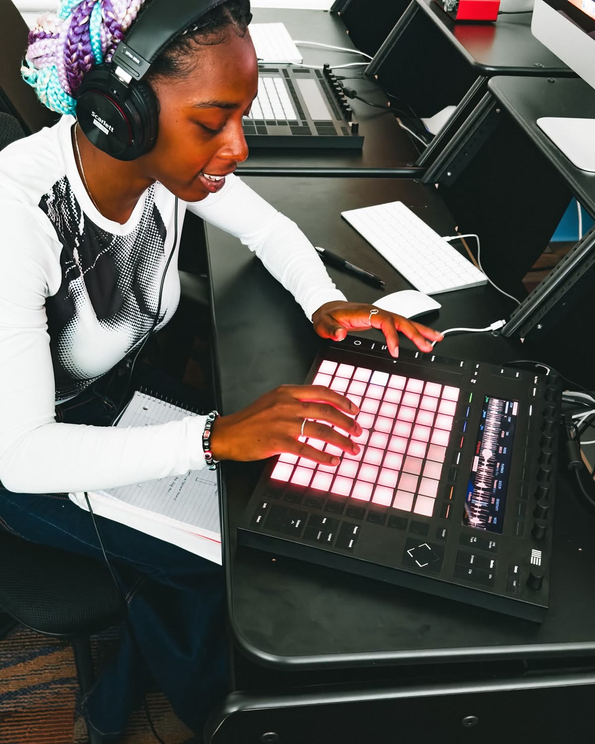 MPT student performing with Ableton Push 3 during a production lab session